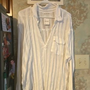 Free people deep v neck blouse.   Size M.   NWT